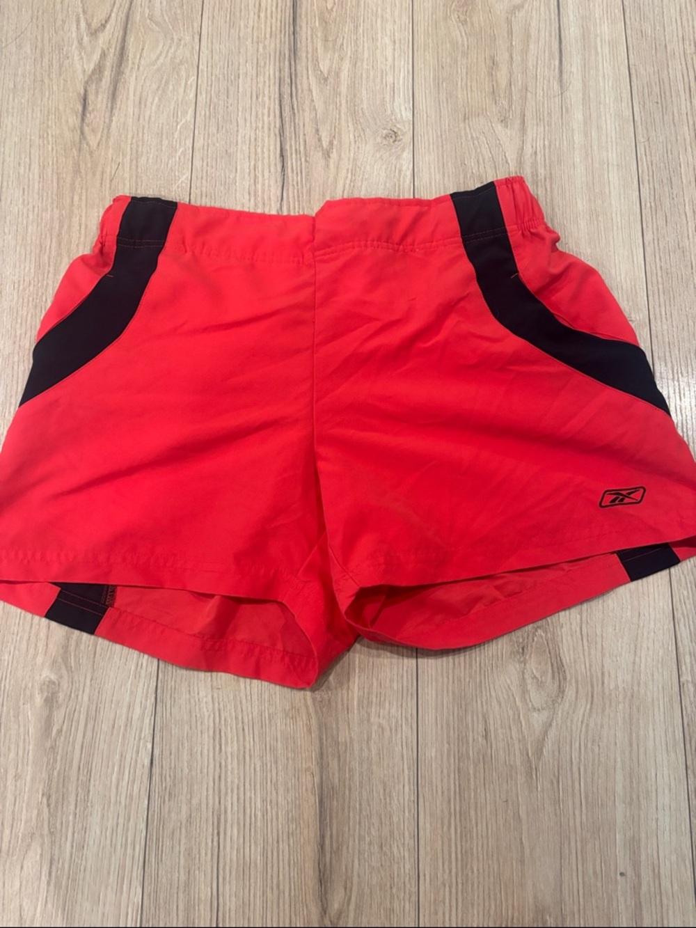 Reebok Women’s Red Athletic Shorts with Black Panels